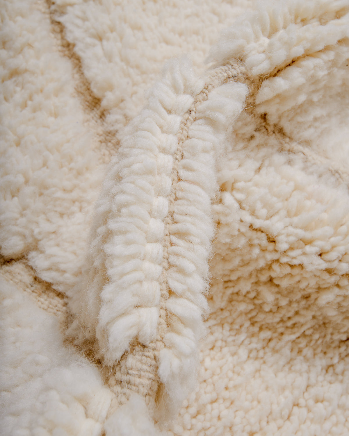 Detail of wool texture of Berberlin beniourain rug. 