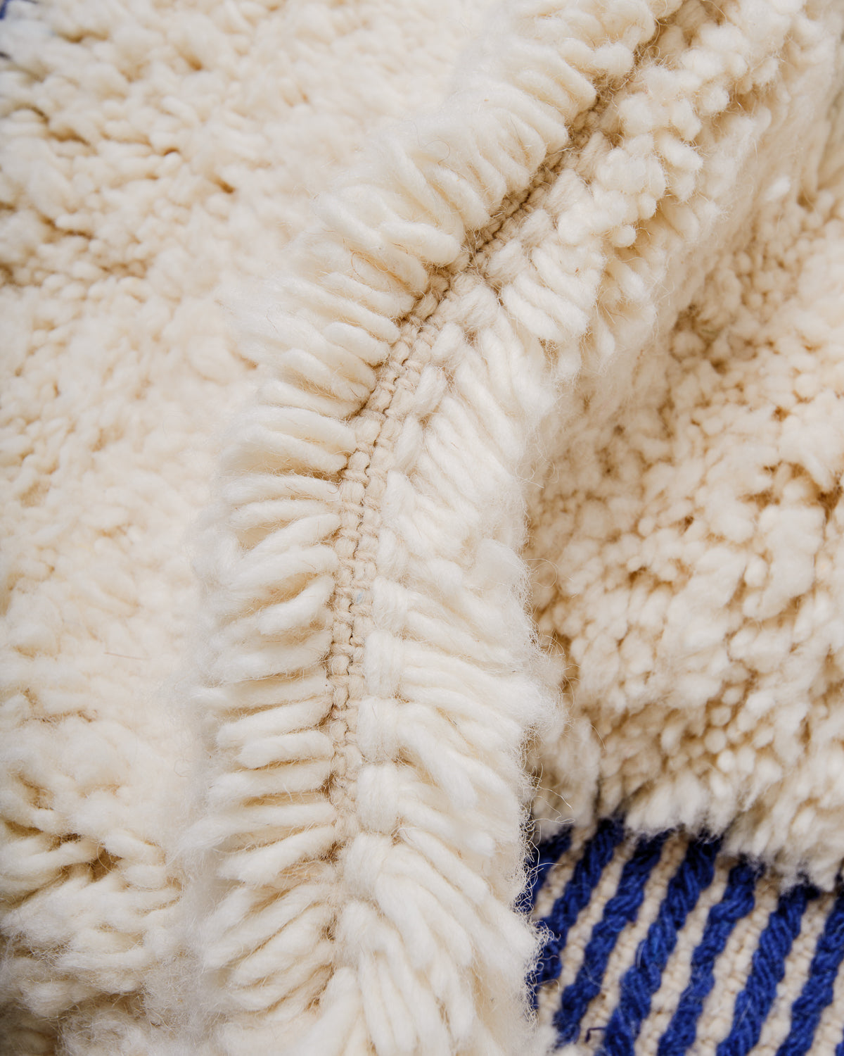 Detail of wool texture of Berberlin beniourain rug. 