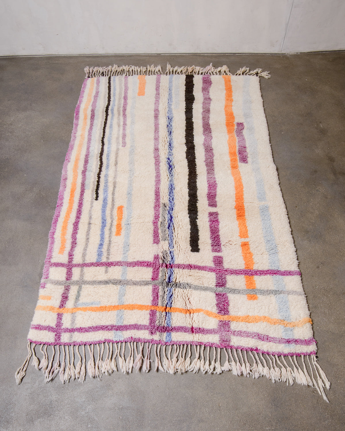 Berberlin Finest Beniourain Rug  laid flat on concrete floor. 