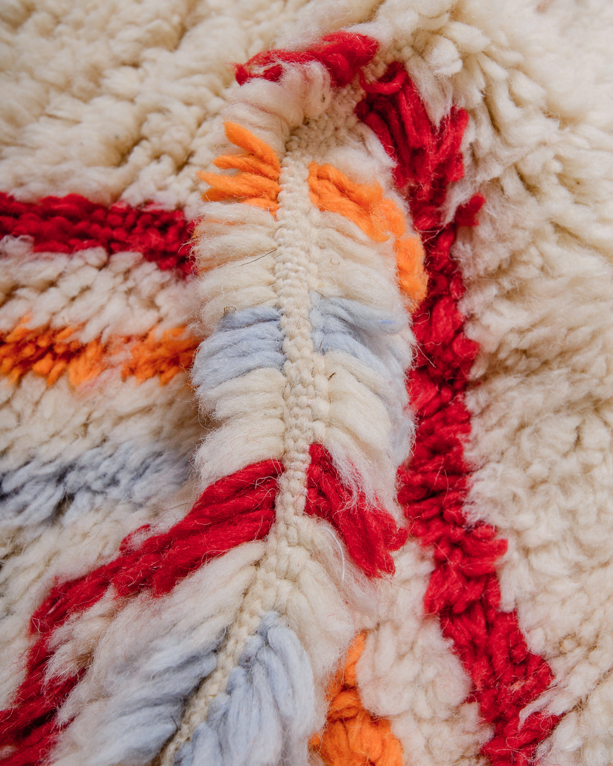 Detail of Berberlin finest rug showing fluffy wool pile and dense knots.