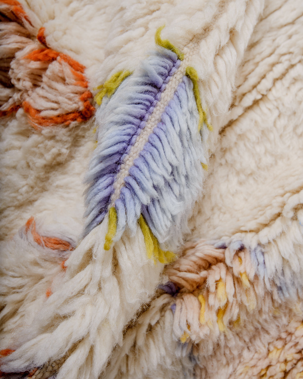 Detail of Berberlin finest rug showing fluffy wool pile and dense knots.