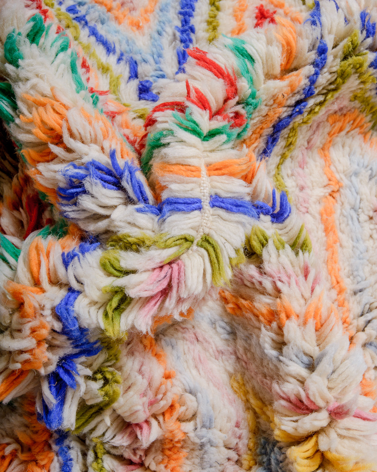 Detail of Berberlin finest rug showing fluffy wool pile and dense knots.