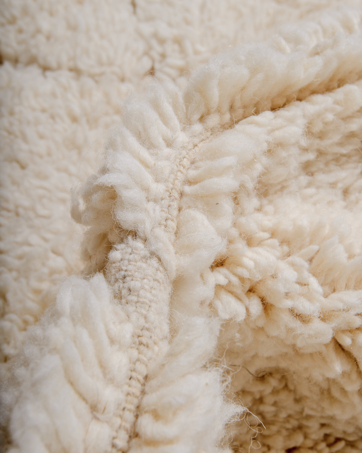 Detail of wool texture of Berberlin beniourain rug. 