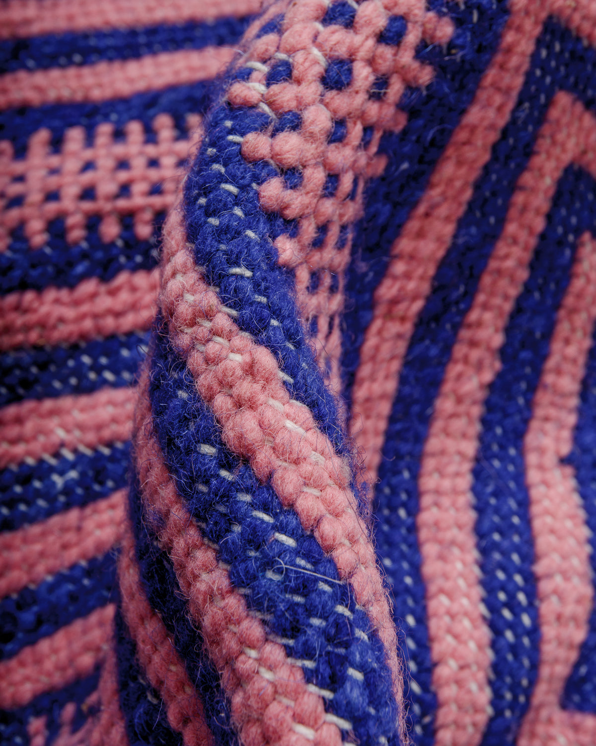 Detail of texture of flat-woven wool of a Kelim rug.