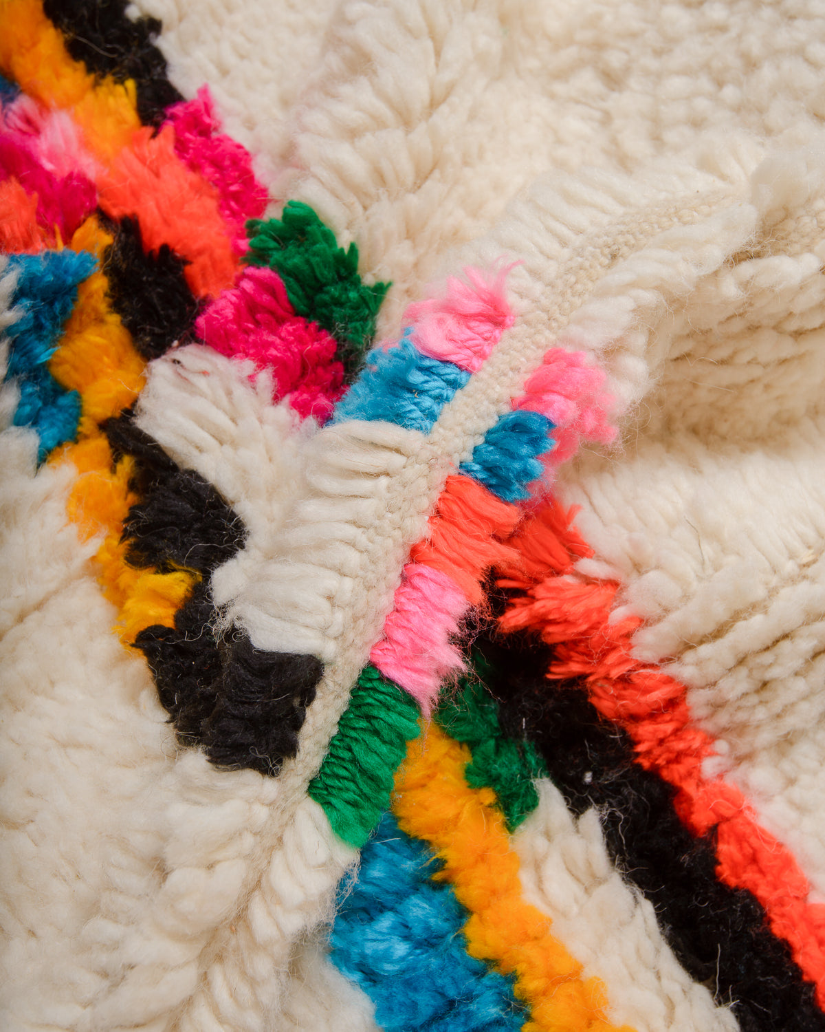 Detail of Azilal rug showing the fluffy wool, soft cotton and the spacing between the rows.