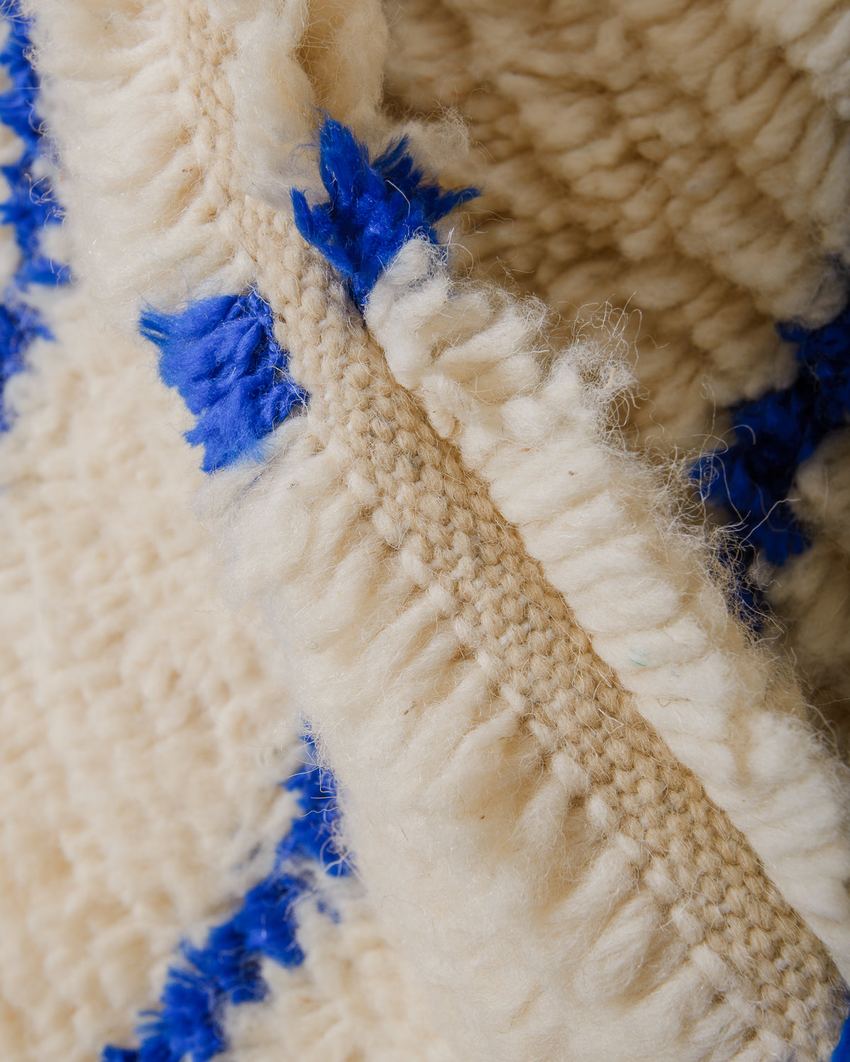 Close-up of Azilal rug showing the fluffy wool and the spacing between the rows.
