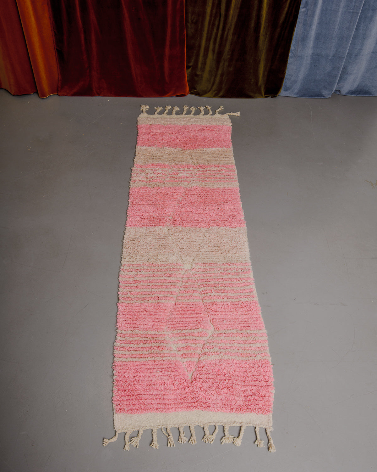 Berberlin Boujaad runner rug on grey floor.