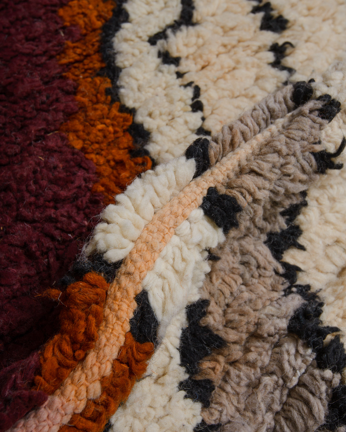 Close up of vintage boujaad rug showing length of pile and wefted rows.