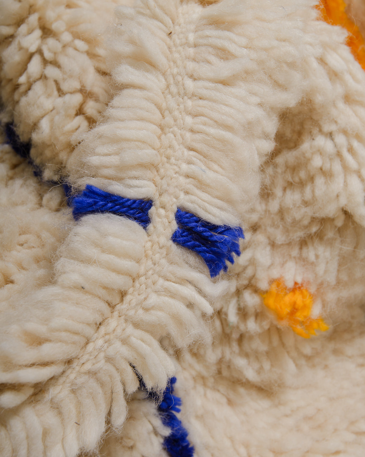 Detail of Azilal rug showing the fluffy wool, soft cotton and the spacing between the rows.
