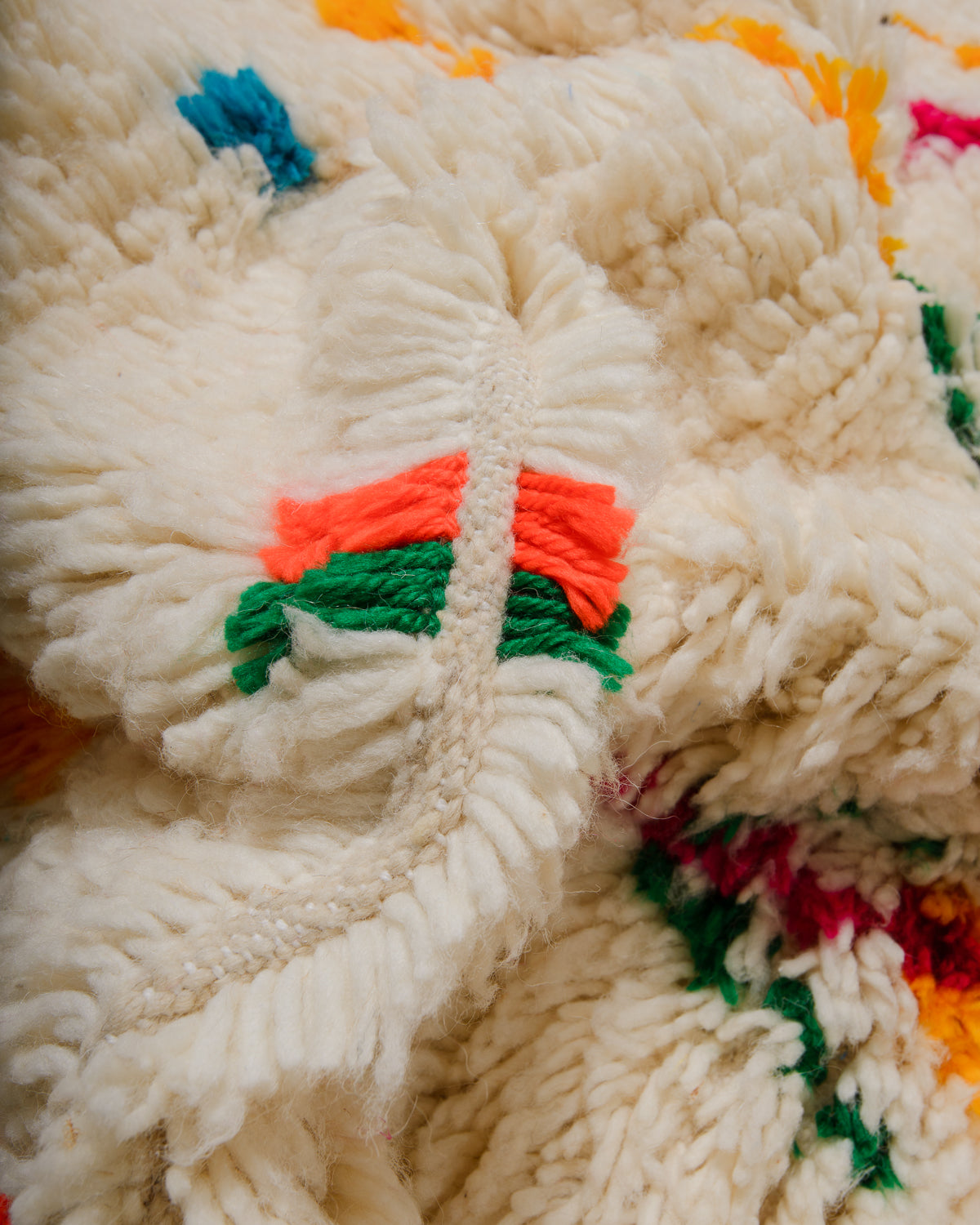 Detail of Azilal rug showing the fluffy wool, soft cotton and the spacing between the rows.