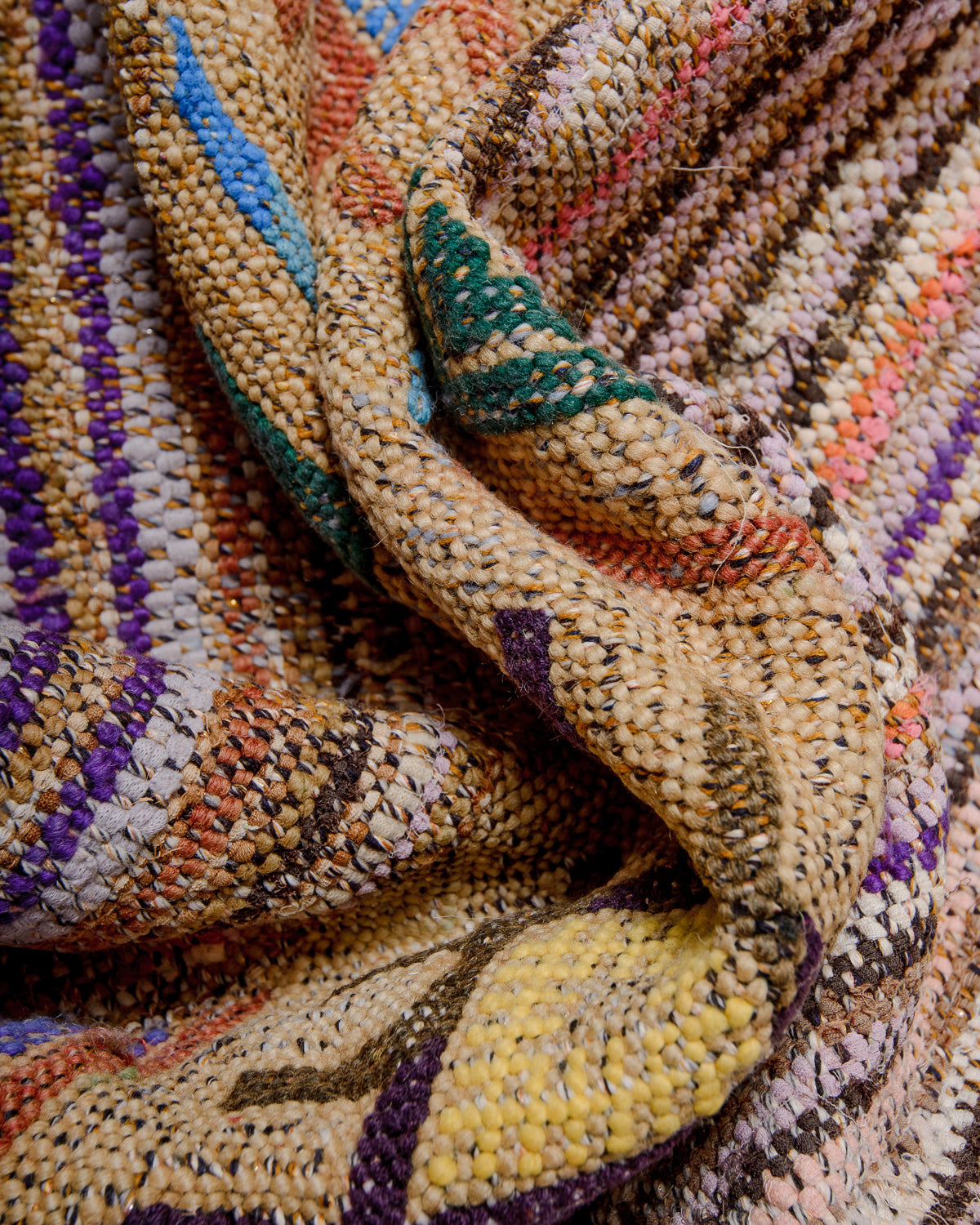 Texture of vintage kelim rug made of recycled wool, cotton and cloth remnants. 