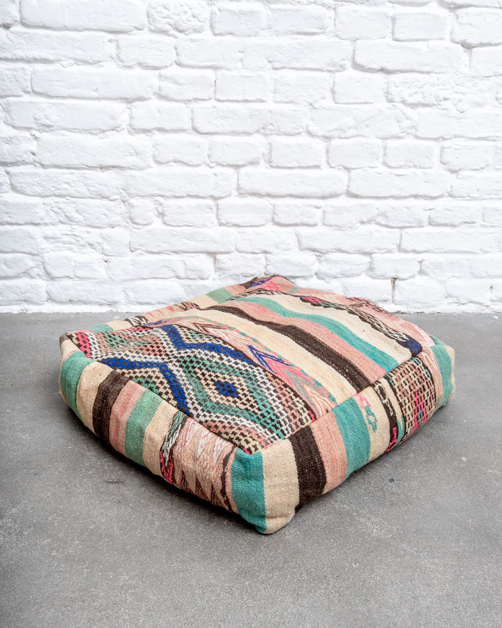 Vintage, handcrafted Berber floor cushion from Morocco. Kelim pouf with beautiful designs and robust flat weave. 100% wool.