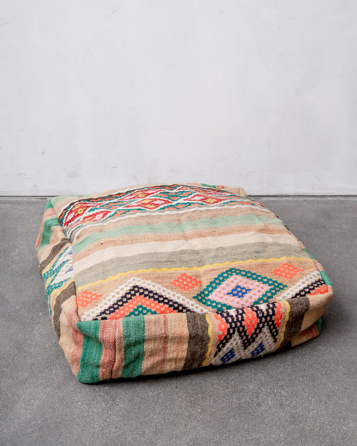 Vintage, handcrafted Berber floor cushion from Morocco. Kelim pouf with beautiful designs and robust flat weave. 100% wool.