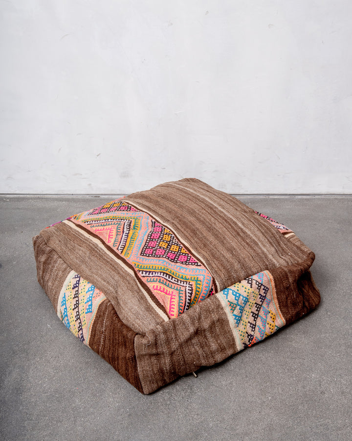 Vintage, handcrafted Berber floor cushion from Morocco. Kelim pouf with beautiful designs and robust flat weave. 100% wool.