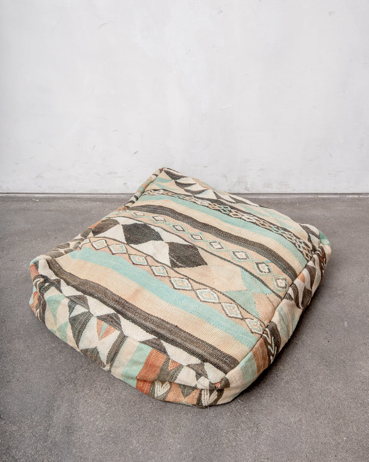 Vintage, handcrafted Berber floor cushion from Morocco. Kelim pouf with beautiful designs and robust flat weave. 100% wool.