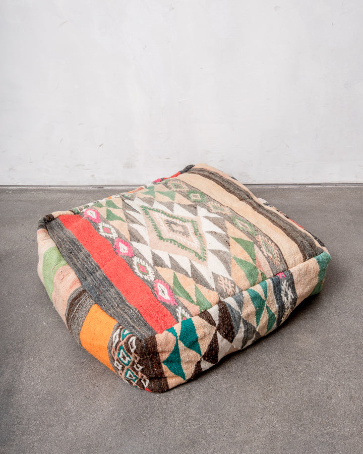 Vintage, handcrafted Berber floor cushion from Morocco. Kelim pouf with beautiful designs and robust flat weave. 100% wool.