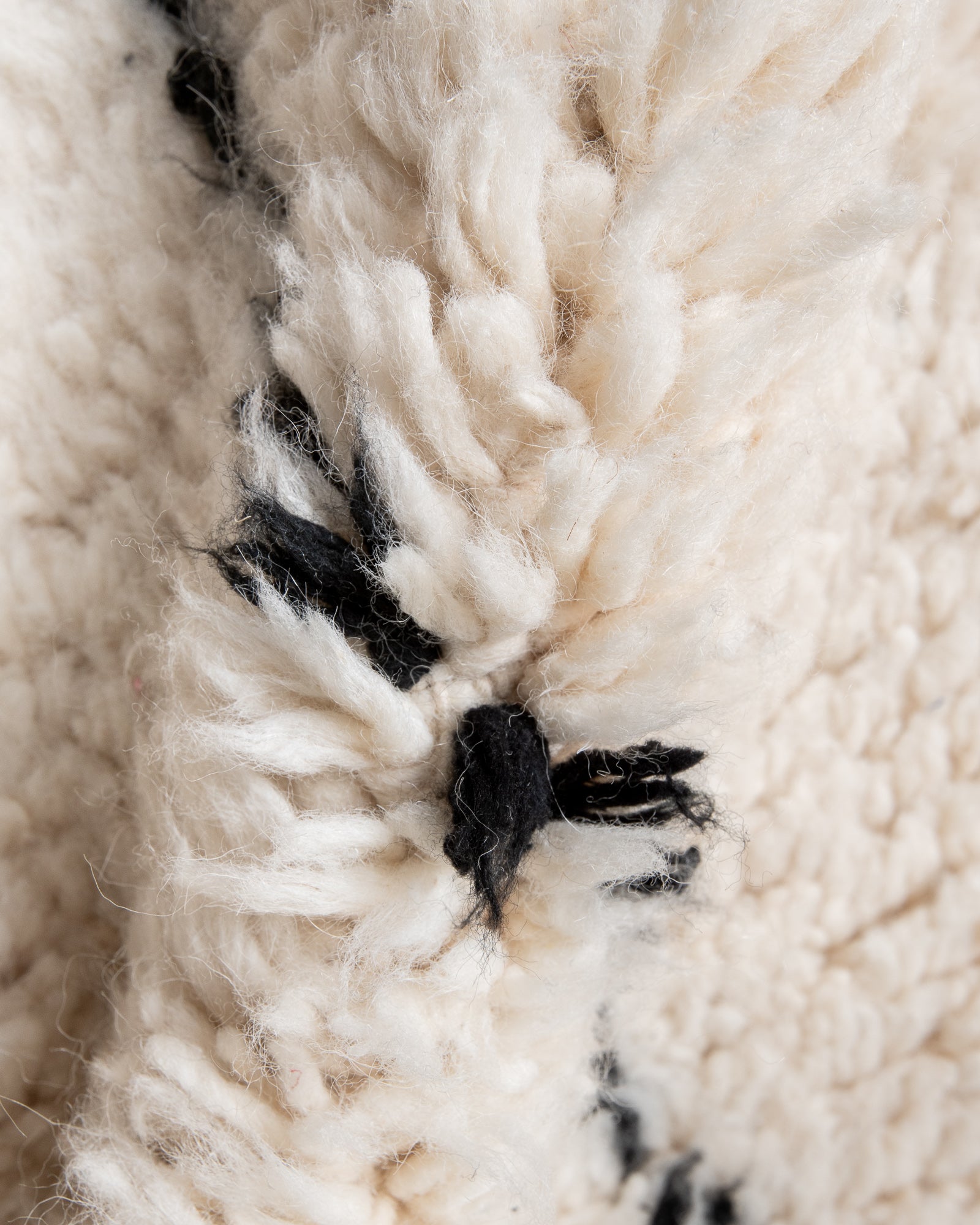 Modern, designer, handcrafted Berber rug from Morocco. Beniourain carpet with minimalist design, natural wool pile and a fluffy texture.