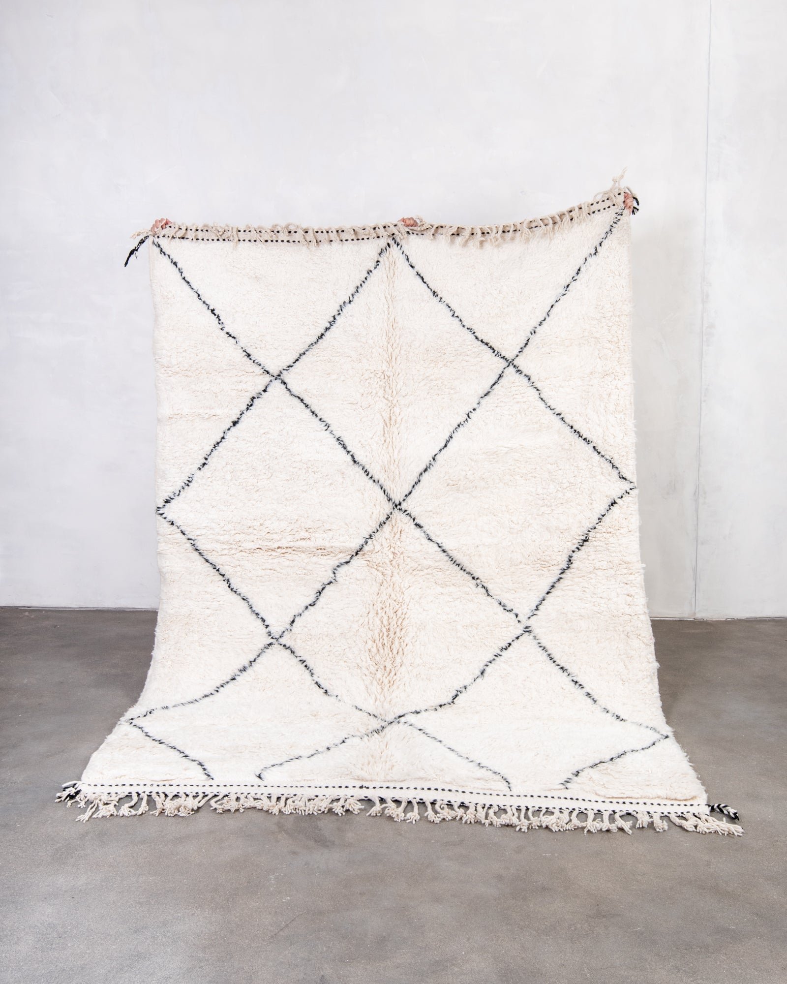 Modern, designer, handcrafted Berber rug from Morocco. Beniourain carpet with beautiful colours and patterns and fluffy wool texture.