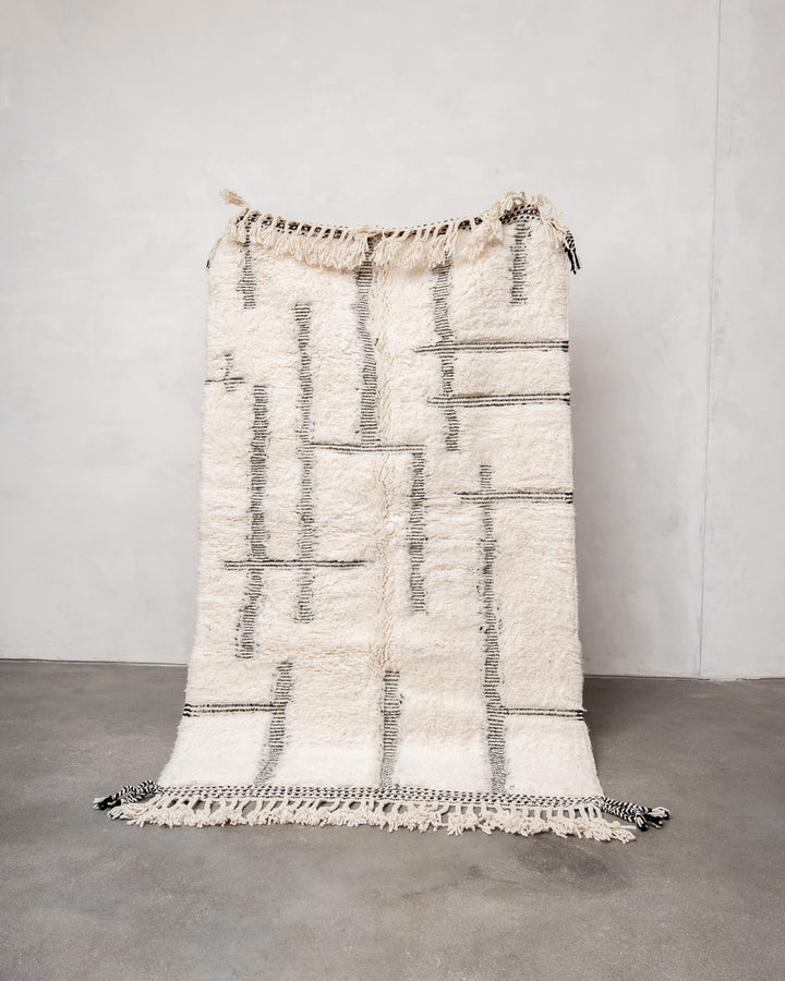 Modern, designer, handcrafted Berber rug from Morocco. Beniourain carpet with beautiful colours and patterns and fluffy wool texture. 