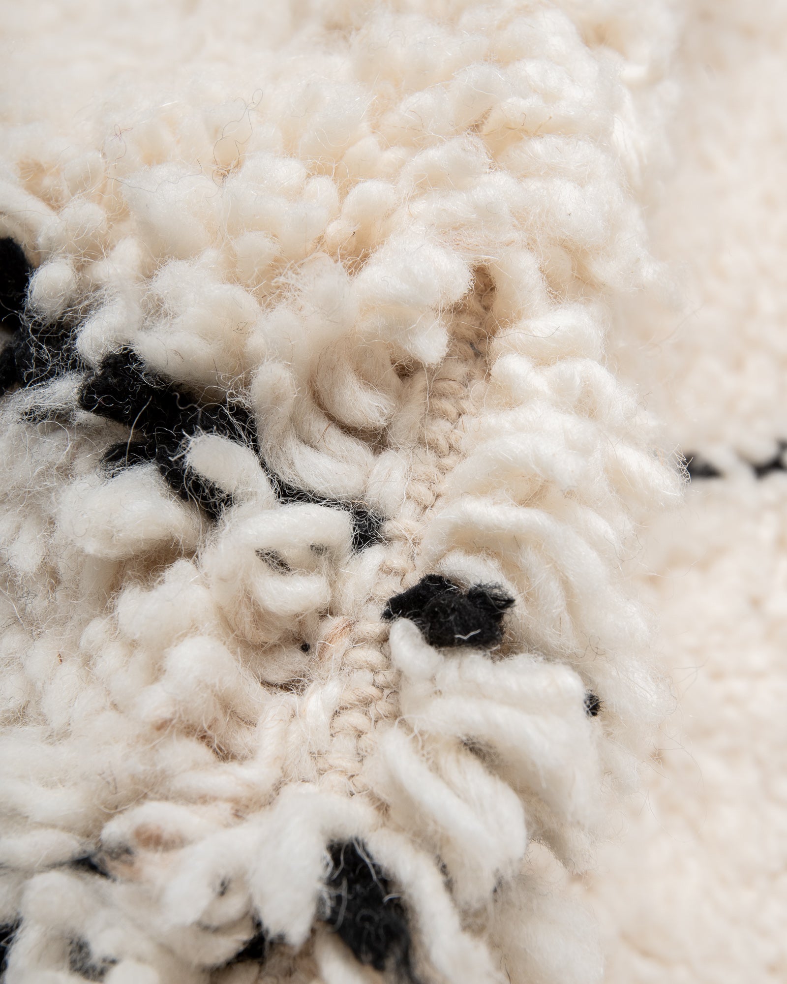 Modern, designer, handcrafted Berber rug from Morocco. Beniourain carpet with beautiful colours and patterns and fluffy wool texture.