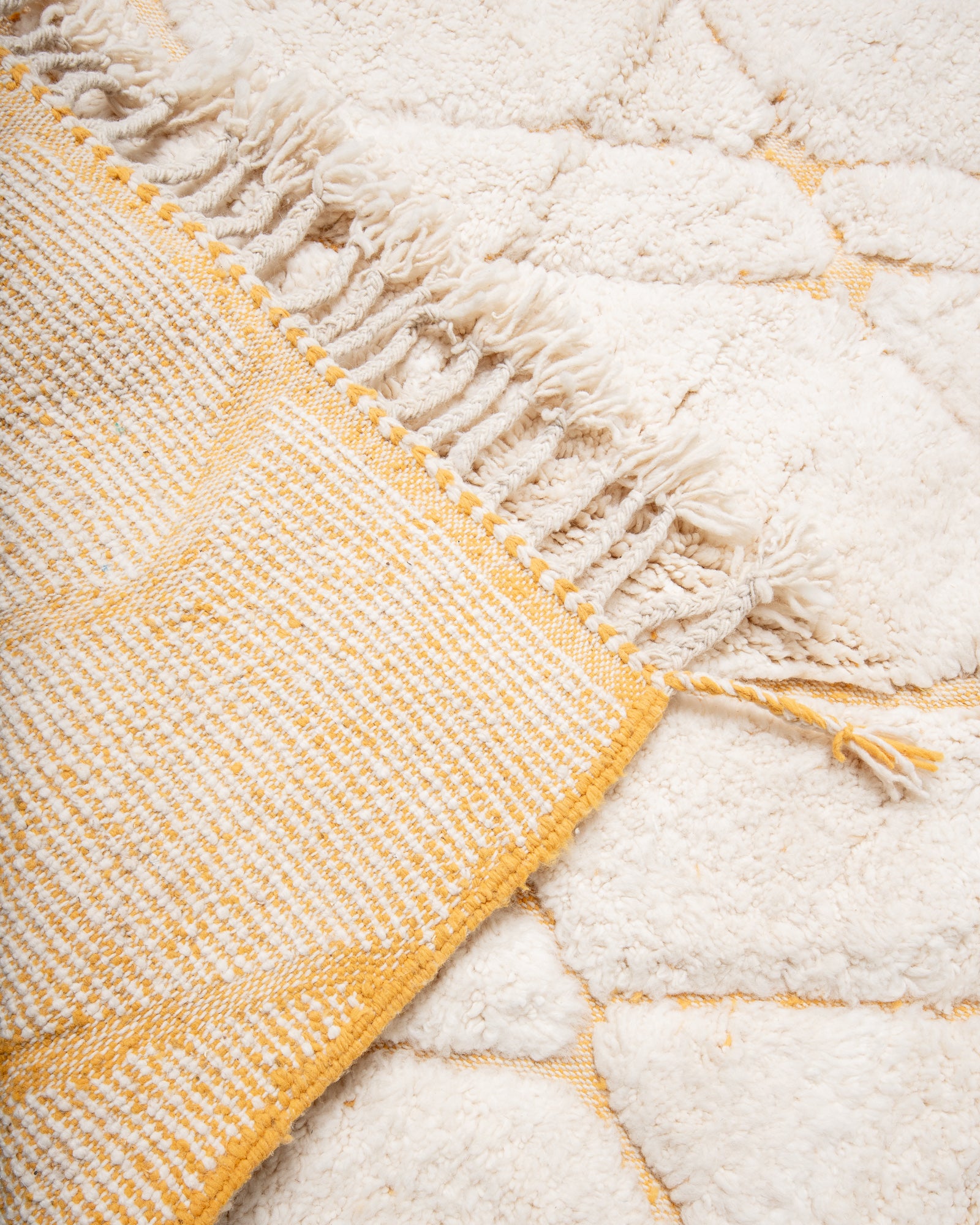 Modern, designer, handcrafted Berber rug from Morocco. Beniourain carpet with beautiful colours and patterns and fluffy wool texture.