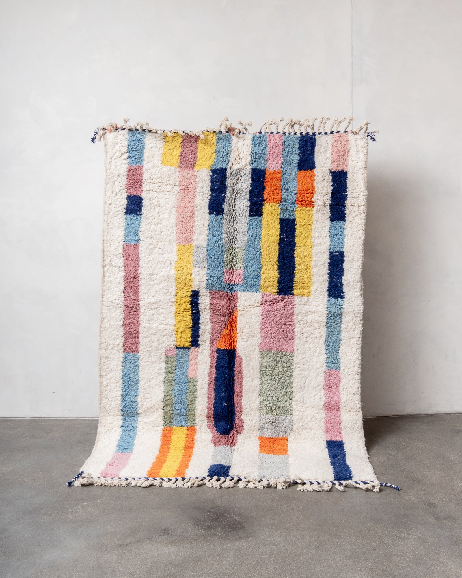 Modern, designer, handcrafted Berber rug from Morocco. Beniourain carpet with beautiful colours and patterns and fluffy wool texture.