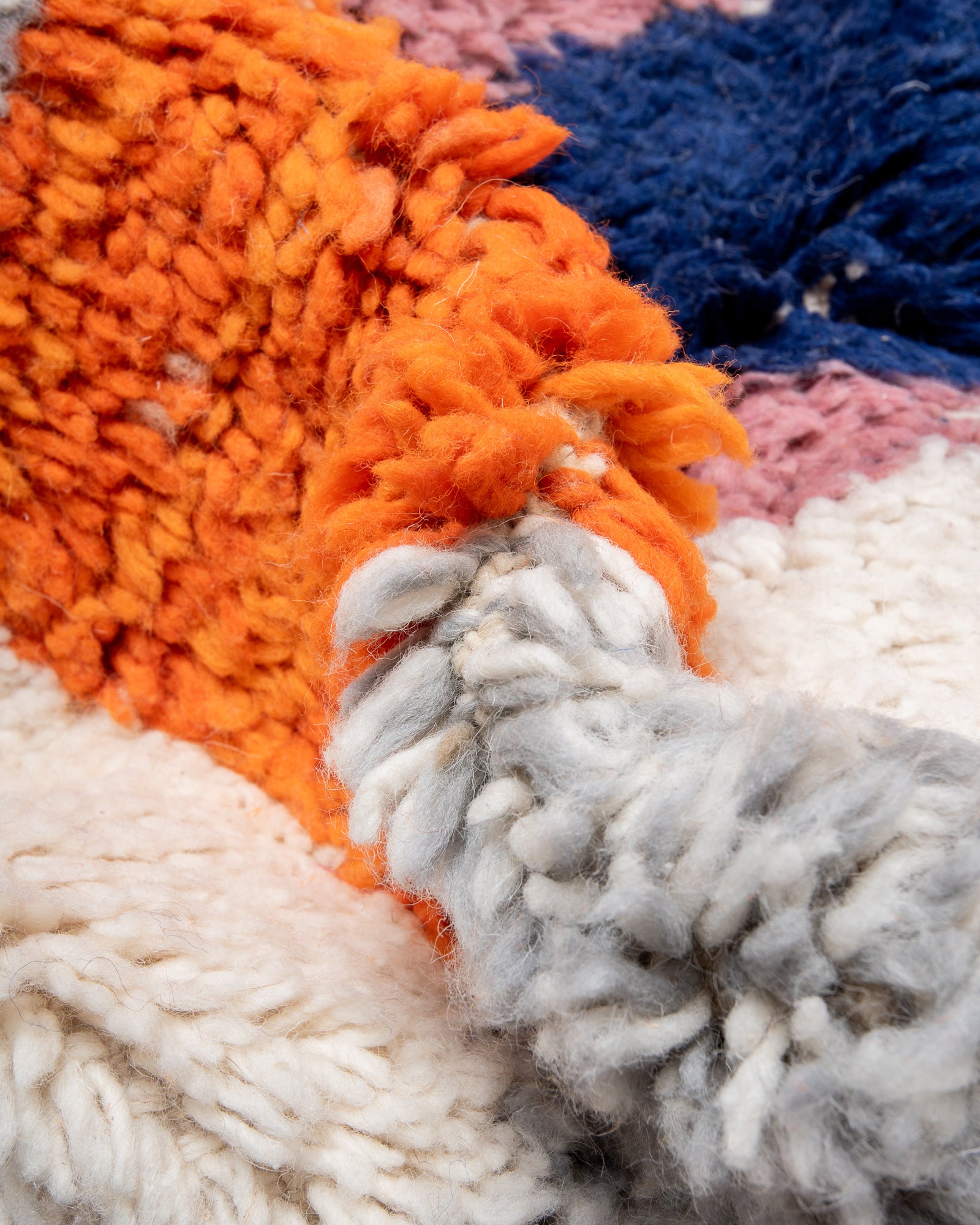 Modern, designer, handcrafted Berber rug from Morocco. Beniourain carpet with beautiful colours and patterns and fluffy wool texture.