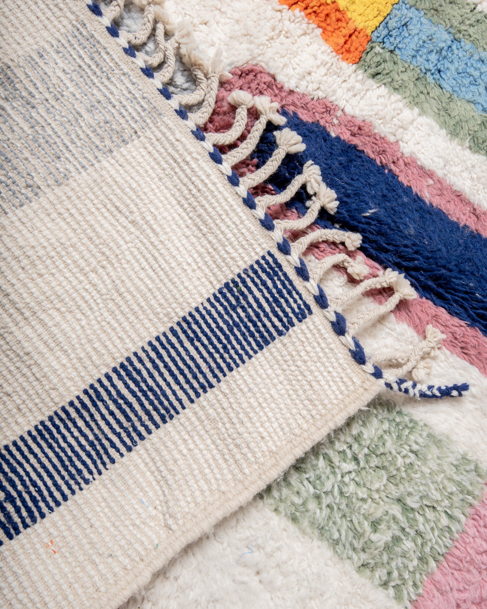 Modern, designer, handcrafted Berber rug from Morocco. Beniourain carpet with beautiful colours and patterns and fluffy wool texture.