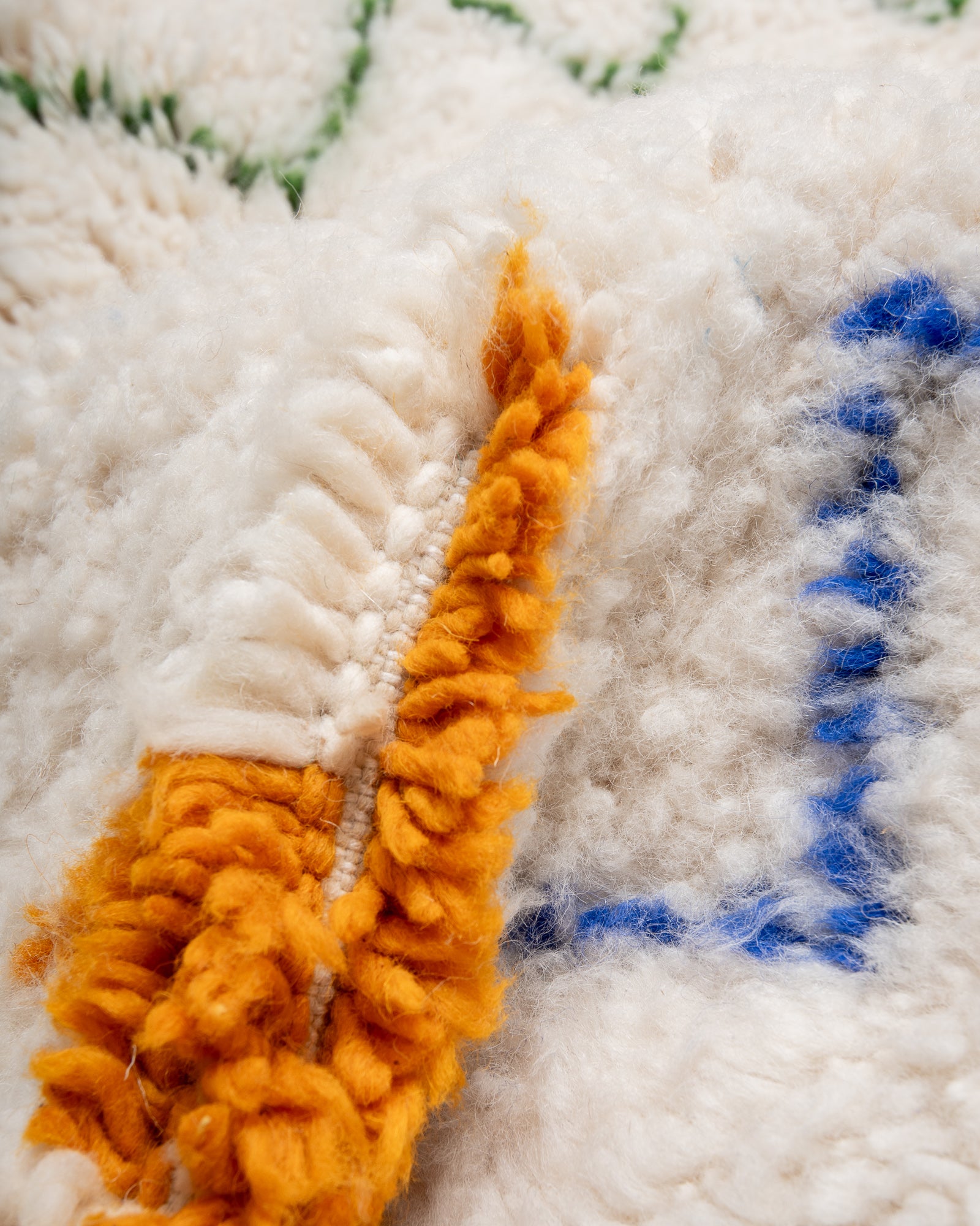 Modern, designer, handcrafted Berber rug from Morocco. Beniourain carpet with beautiful colours and patterns and fluffy wool texture. 