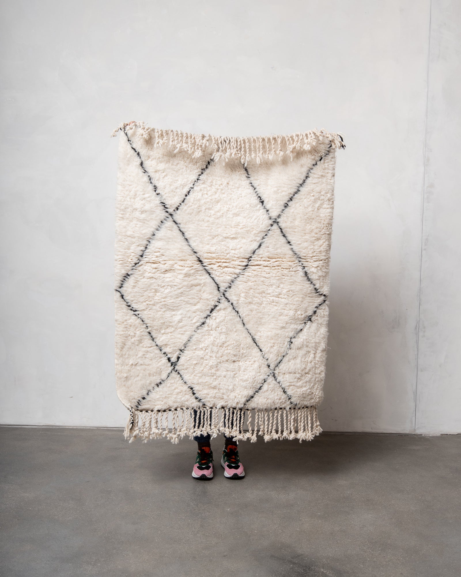 Modern, designer, handcrafted Berber rug from Morocco. Beniourain carpet with minimalist design, natural wool pile and a fluffy texture.