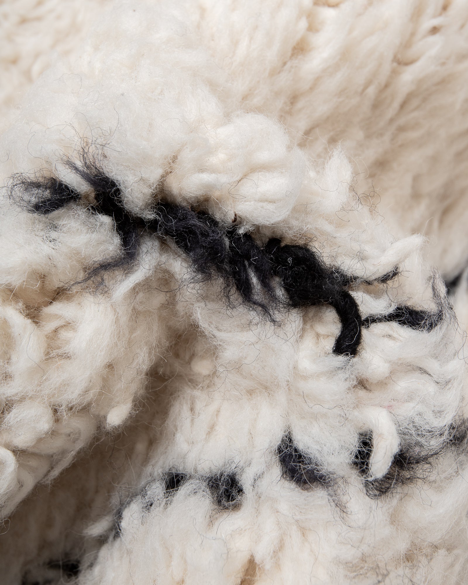 Modern, designer, handcrafted Berber rug from Morocco. Beniourain carpet with minimalist design, natural wool pile and a fluffy texture.