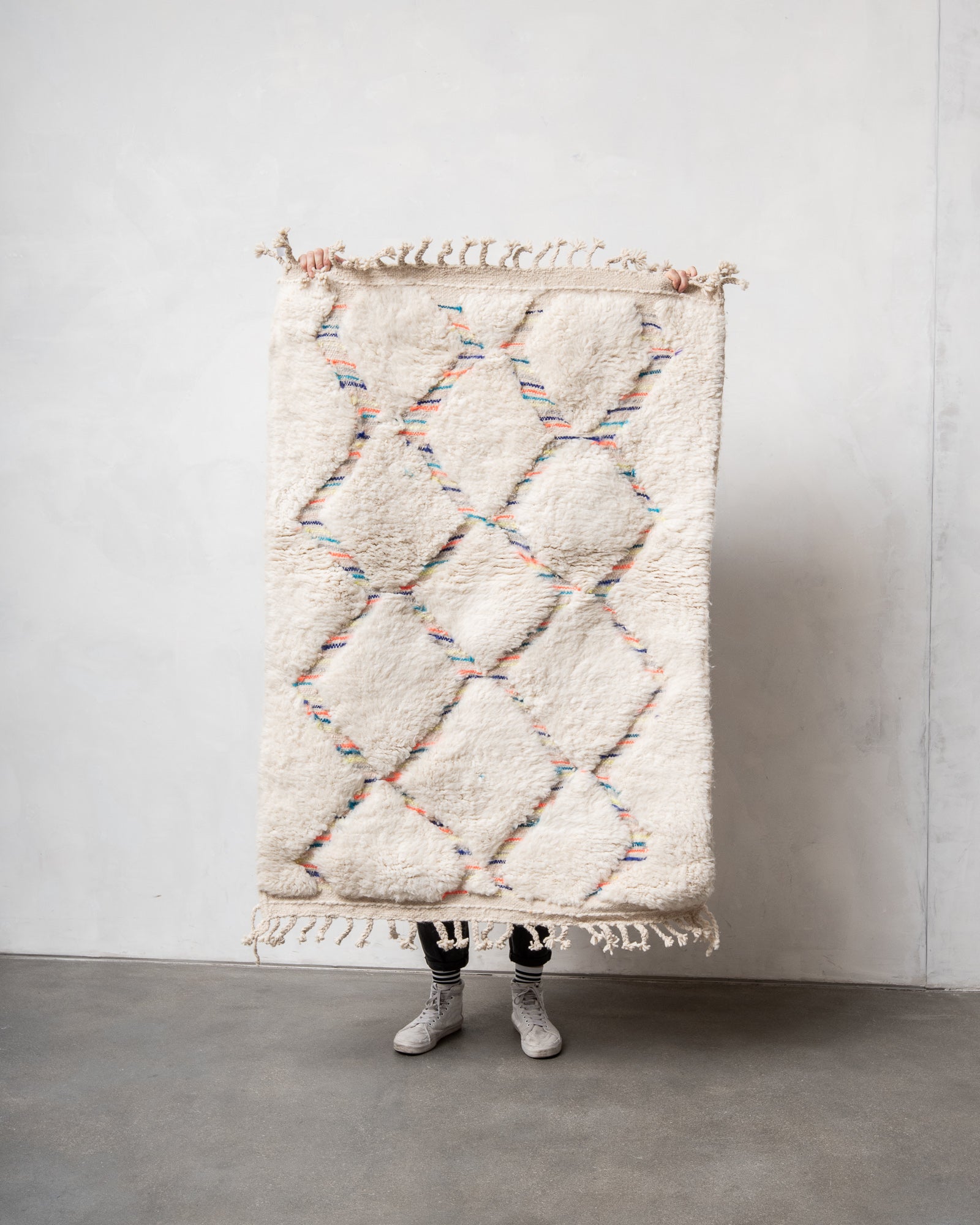 Modern, designer, handcrafted Berber rug from Morocco. Beniourain carpet with beautiful colours and patterns and fluffy wool texture.