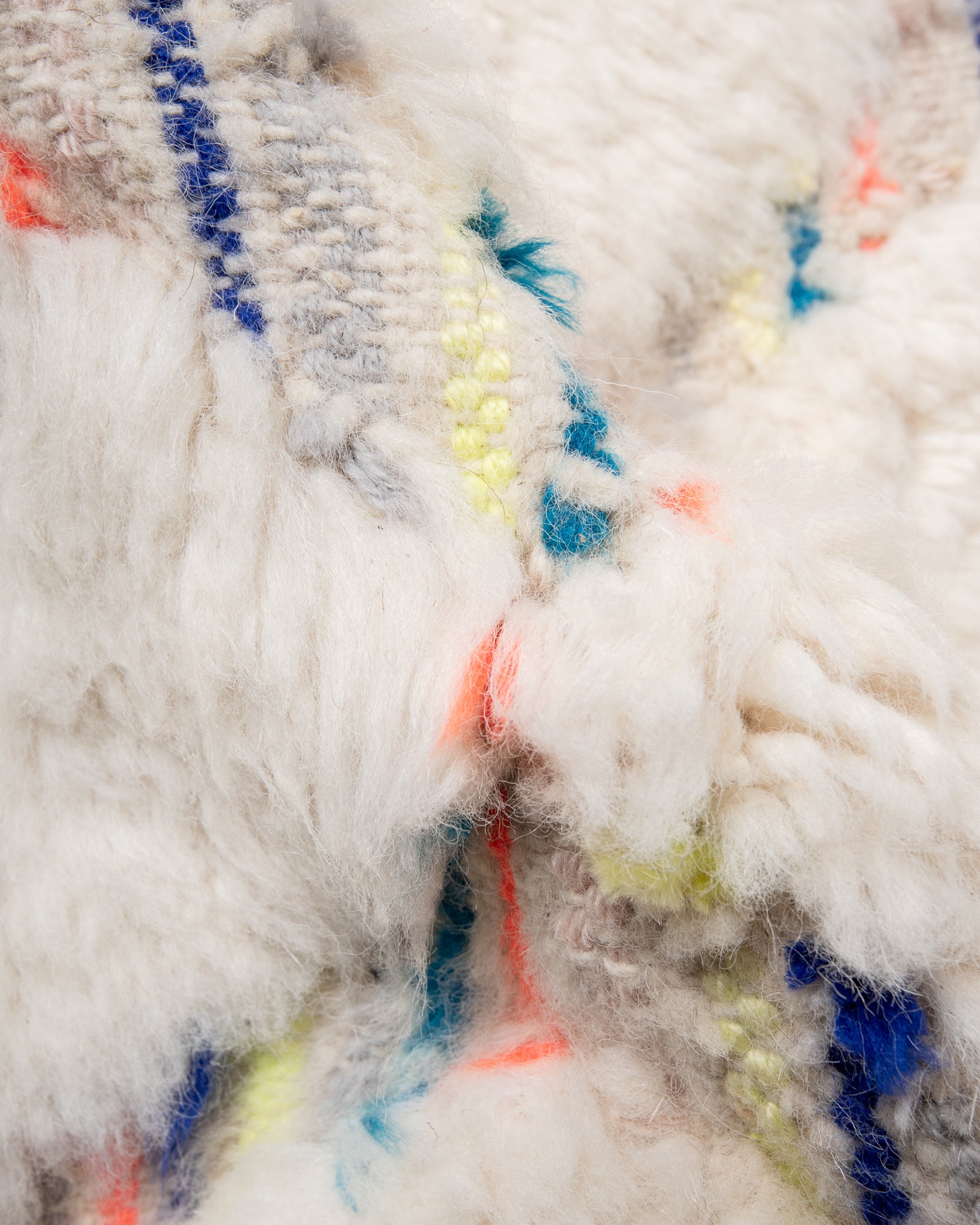 Modern, designer, handcrafted Berber rug from Morocco. Beniourain carpet with beautiful colours and patterns and fluffy wool texture.