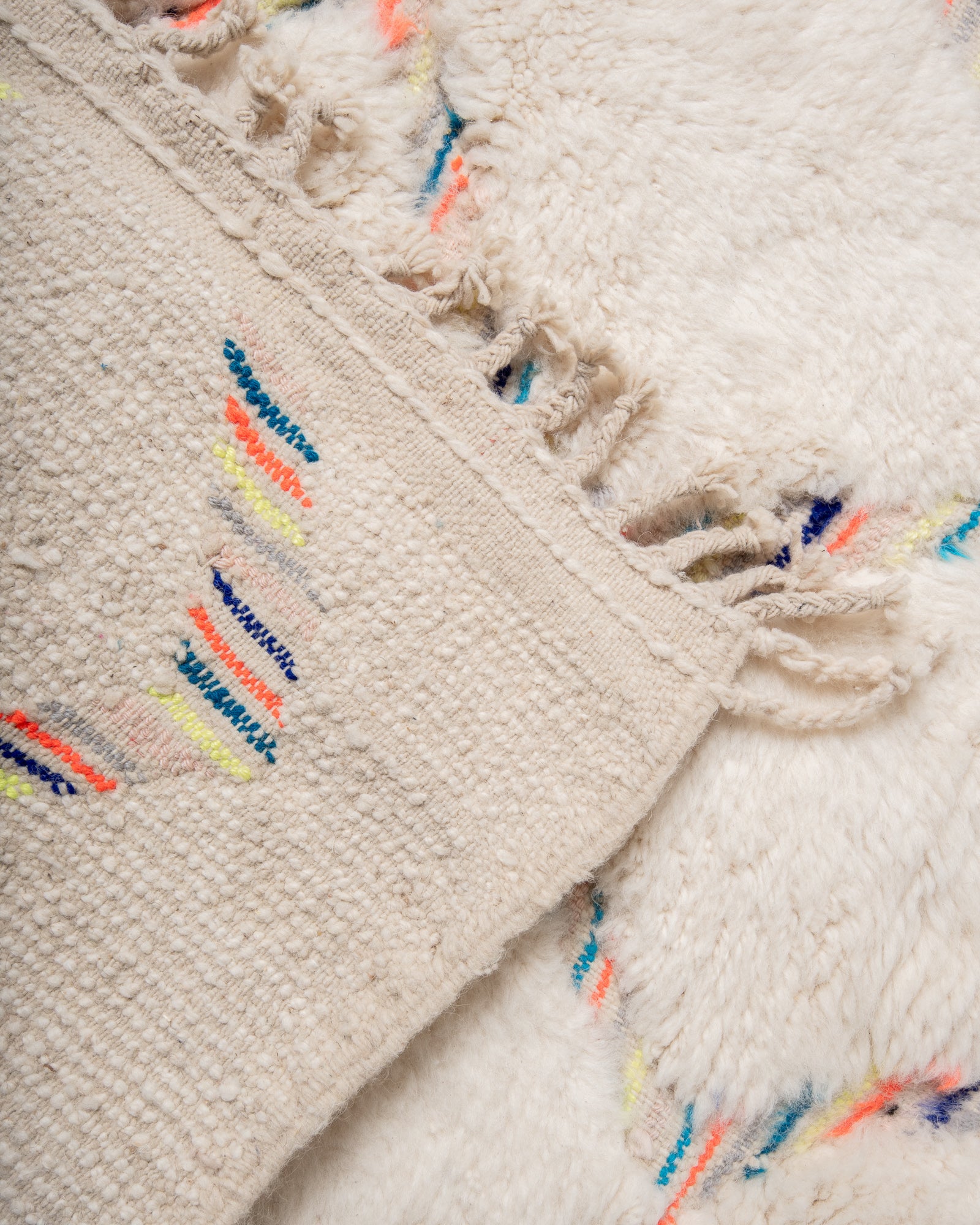 Modern, designer, handcrafted Berber rug from Morocco. Beniourain carpet with beautiful colours and patterns and fluffy wool texture.