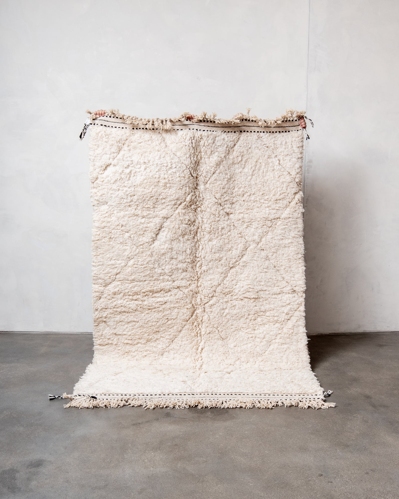 Modern, designer, handcrafted Berber rug from Morocco. Beniourain carpet with beautiful colours and patterns and fluffy wool texture.