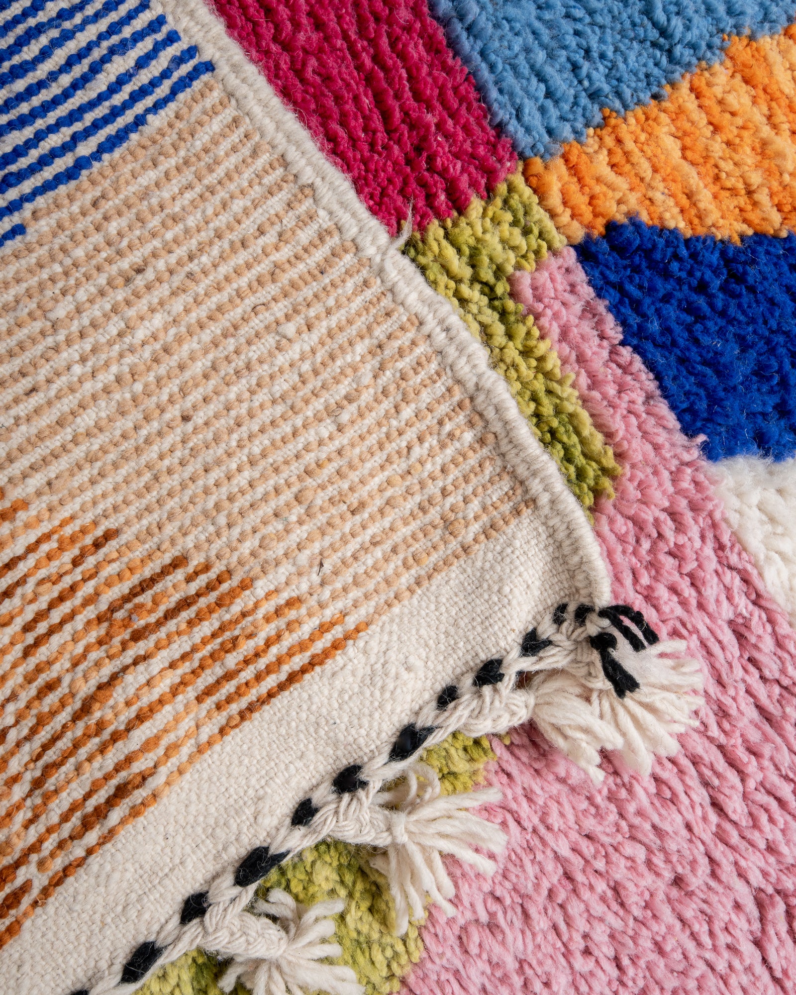 Modern, designer, handcrafted Berber rug from Morocco. Beniourain carpet with beautiful colours and patterns and fluffy wool texture. 