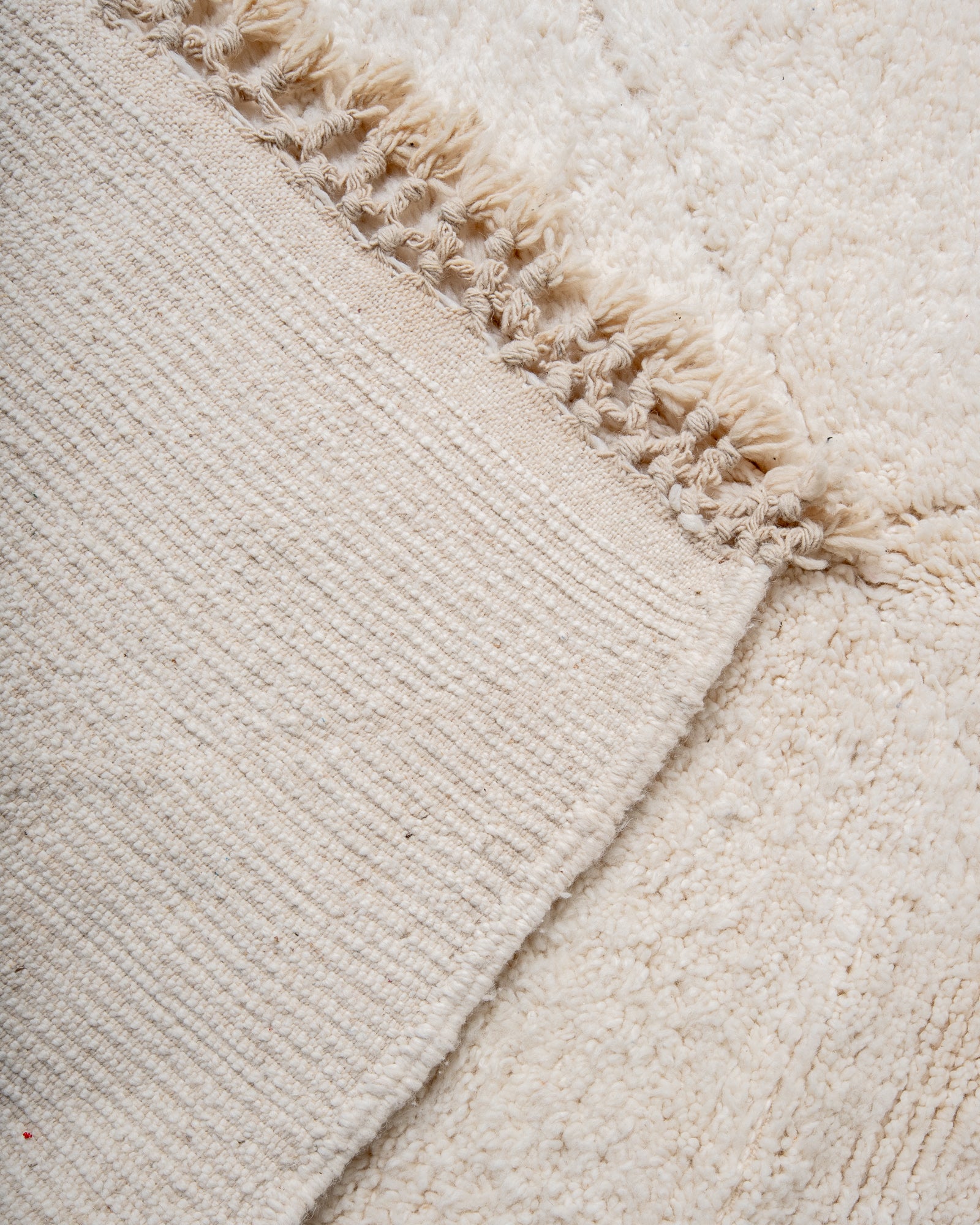 Modern, designer, handcrafted Berber rug from Morocco. Beniourain carpet with beautiful colours and patterns and fluffy wool texture. 