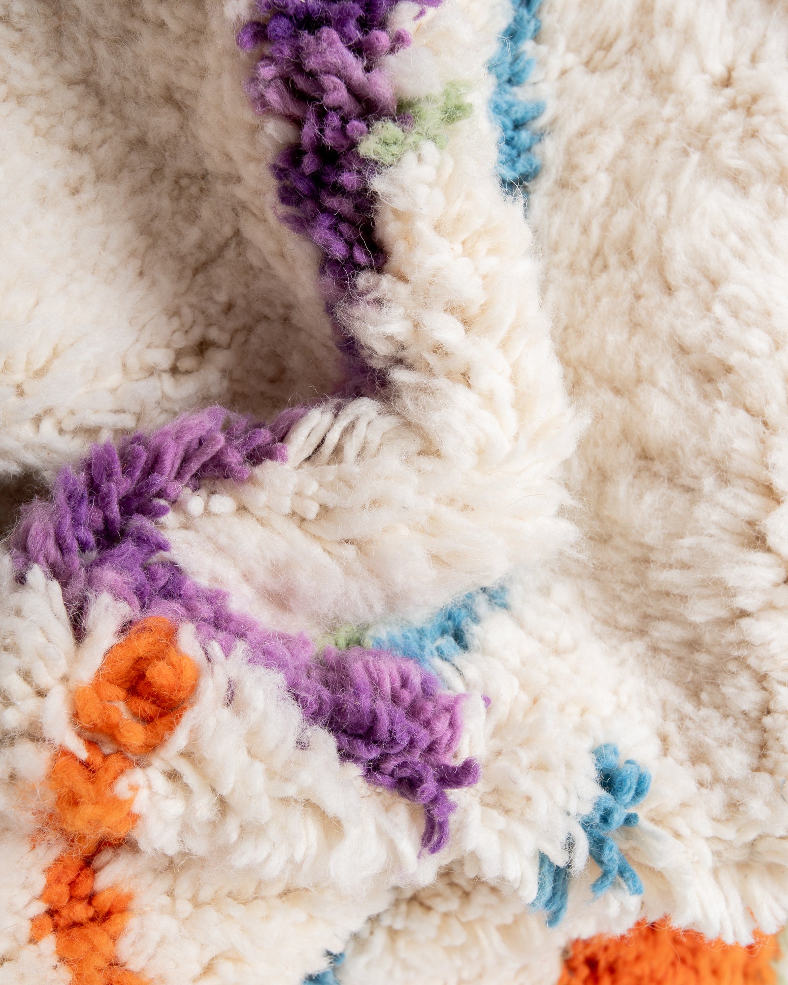 Modern, designer, handcrafted Berber rug from Morocco. Beniourain carpet with beautiful colours and patterns and fluffy wool texture.