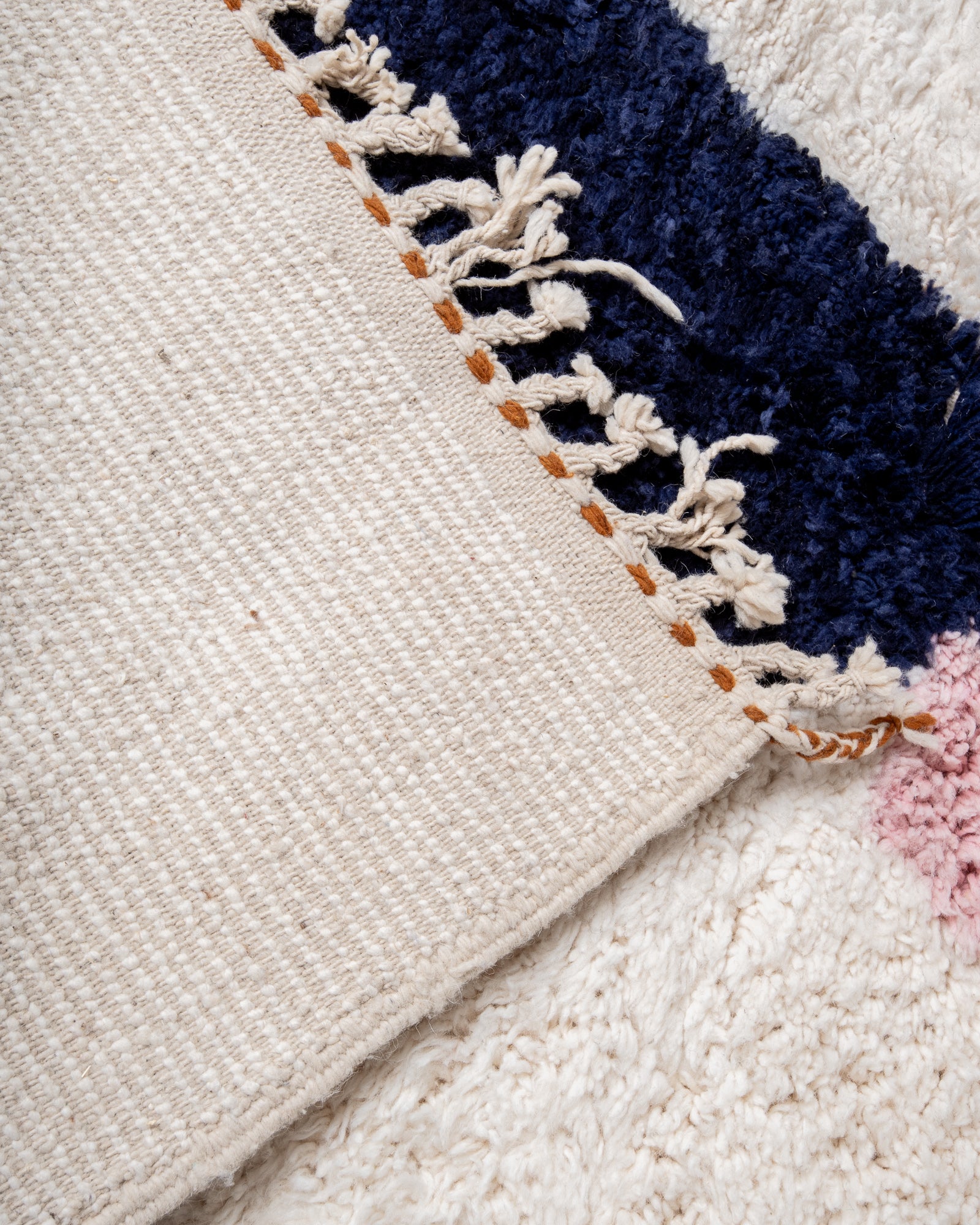 Modern, designer, handcrafted Berber rug from Morocco. Beniourain carpet with beautiful colours and patterns and fluffy wool texture.