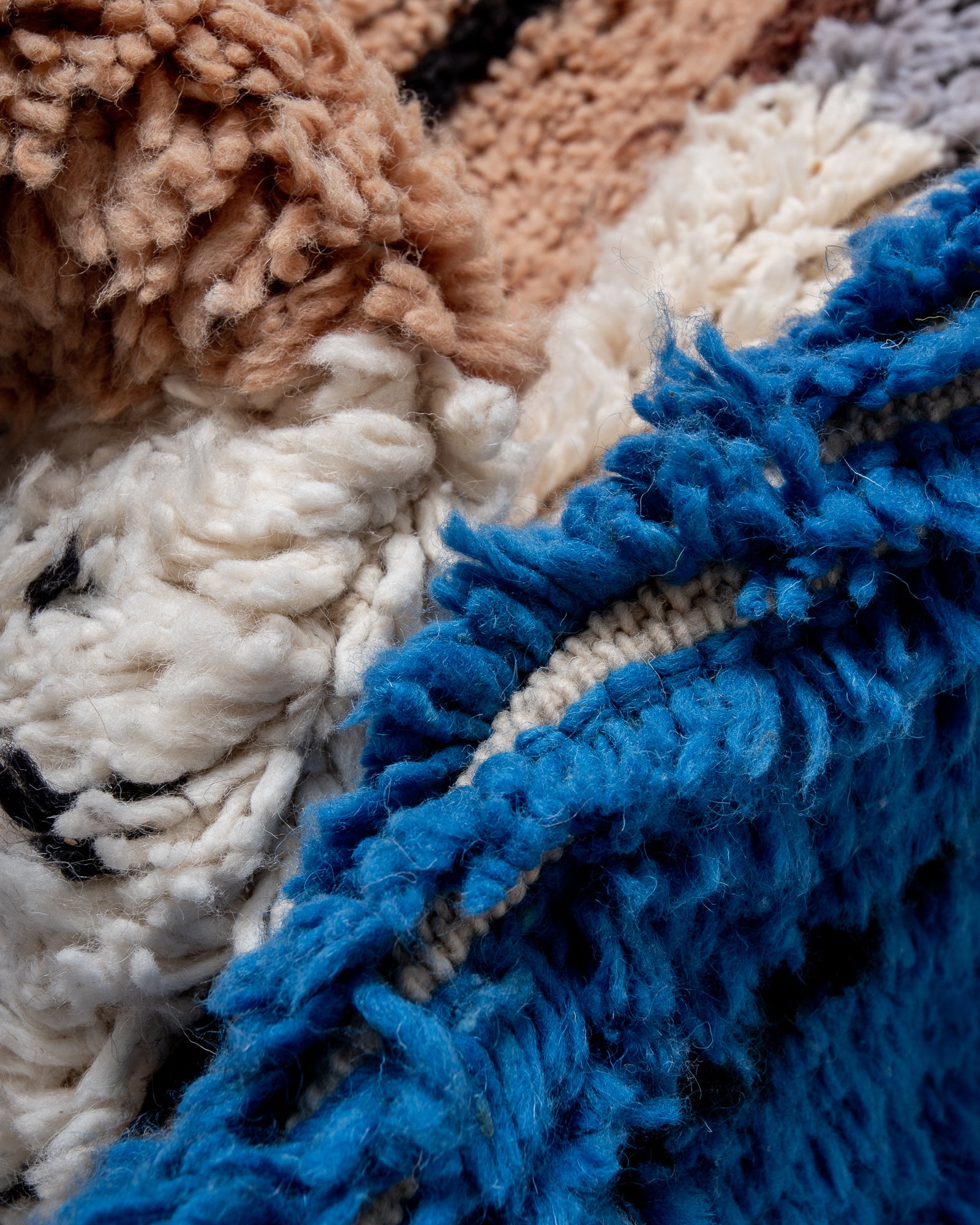 Modern, designer, handcrafted Berber rug from Morocco. Beniourain carpet with beautiful colours and patterns and fluffy wool texture.