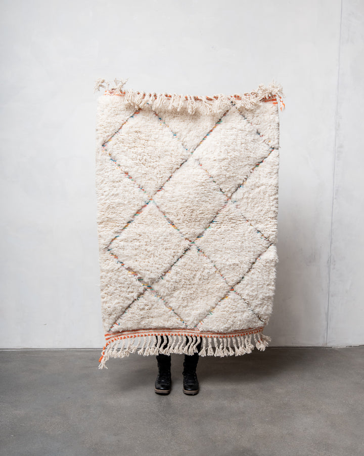 Modern, designer, handcrafted Berber rug from Morocco. Beniourain carpet with beautiful colours and patterns and fluffy wool texture.