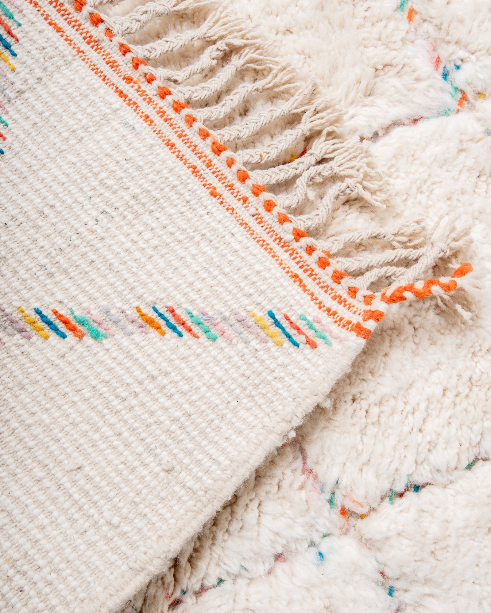 Modern, designer, handcrafted Berber rug from Morocco. Beniourain carpet with beautiful colours and patterns and fluffy wool texture.