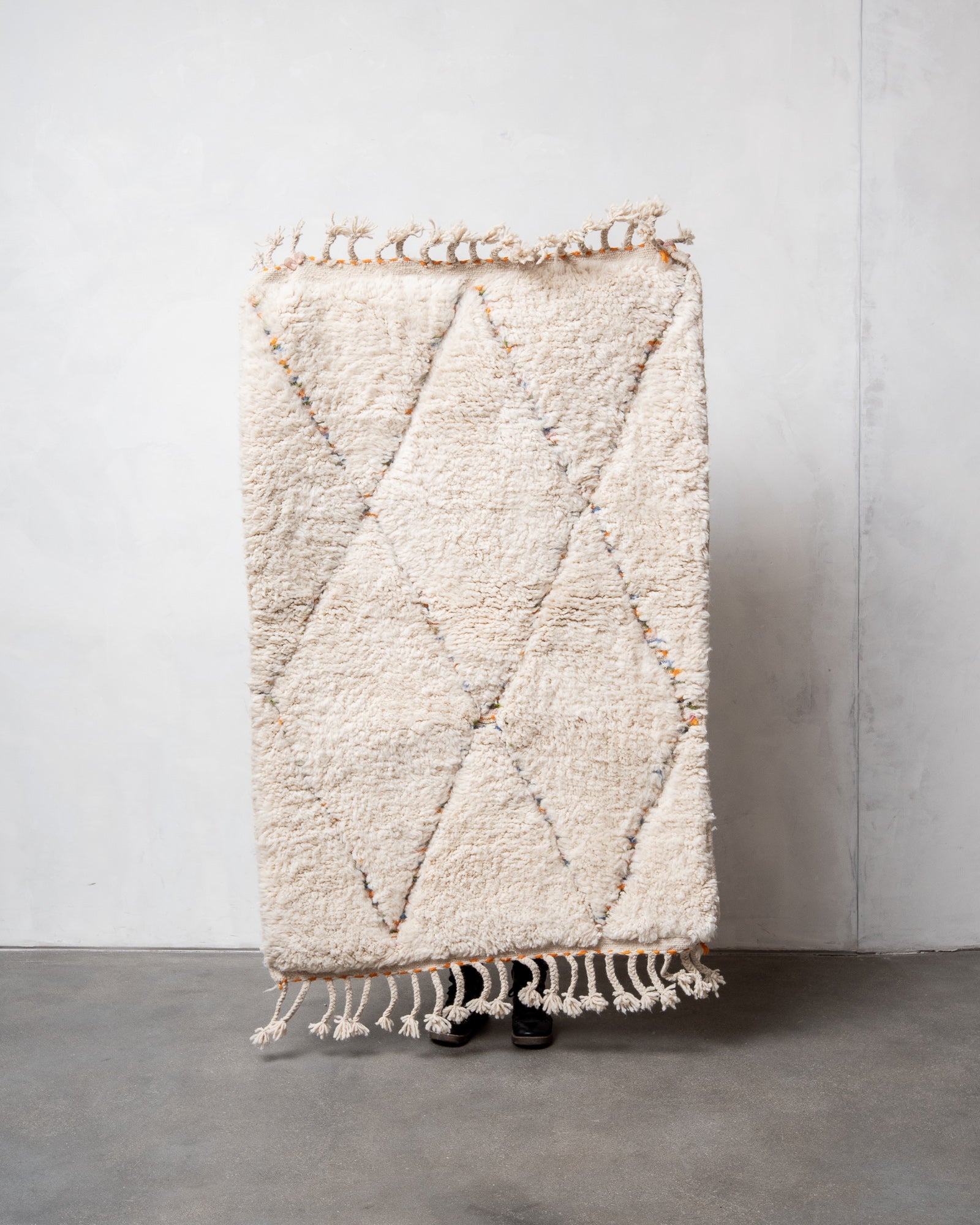 Modern, designer, handcrafted Berber rug from Morocco. Beniourain carpet with beautiful colours and patterns and fluffy wool texture.