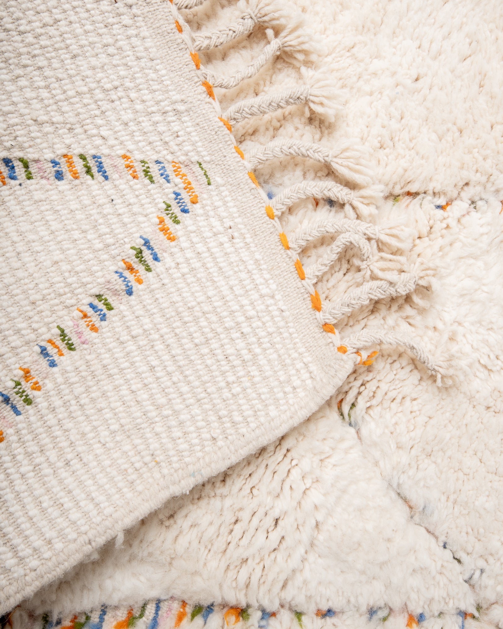 Modern, designer, handcrafted Berber rug from Morocco. Beniourain carpet with beautiful colours and patterns and fluffy wool texture.