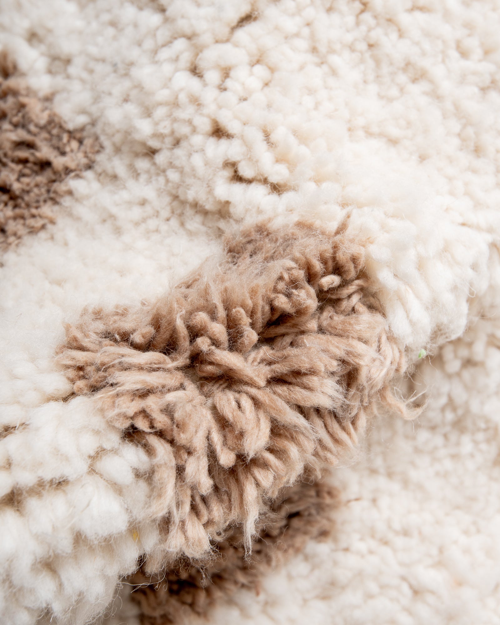 Modern, designer, handcrafted Berber rug from Morocco. Beniourain carpet with beautiful colours and patterns and fluffy wool texture.