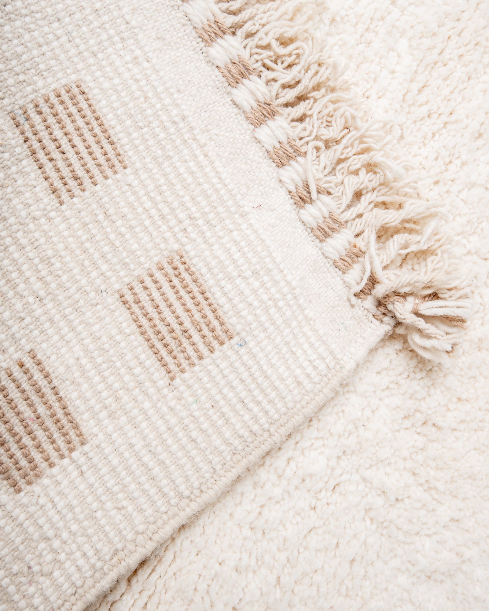 Modern, designer, handcrafted Berber rug from Morocco. Beniourain carpet with beautiful colours and patterns and fluffy wool texture.