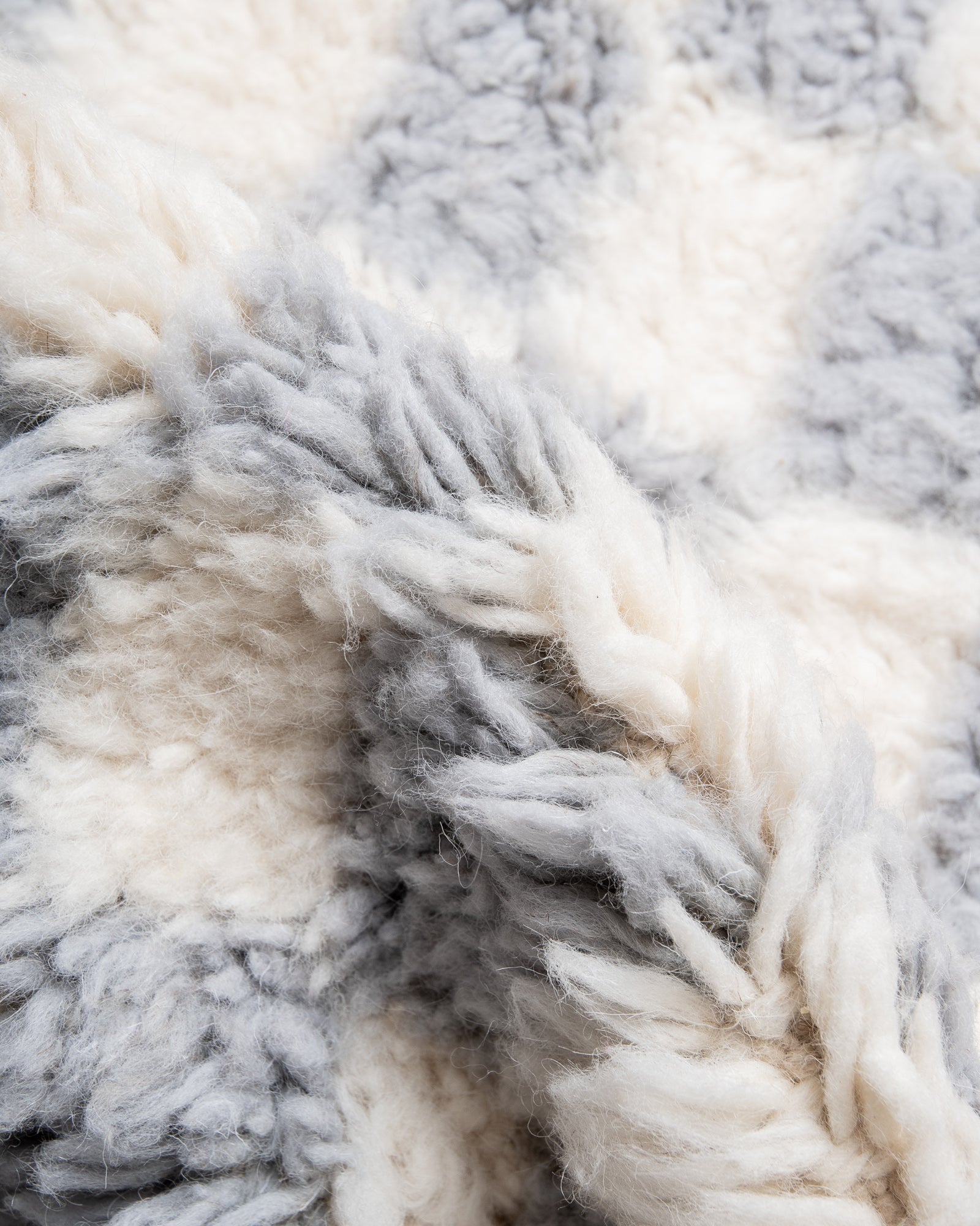 Modern, designer, handcrafted Berber rug from Morocco. Beniourain carpet with beautiful colours and patterns and fluffy wool texture.