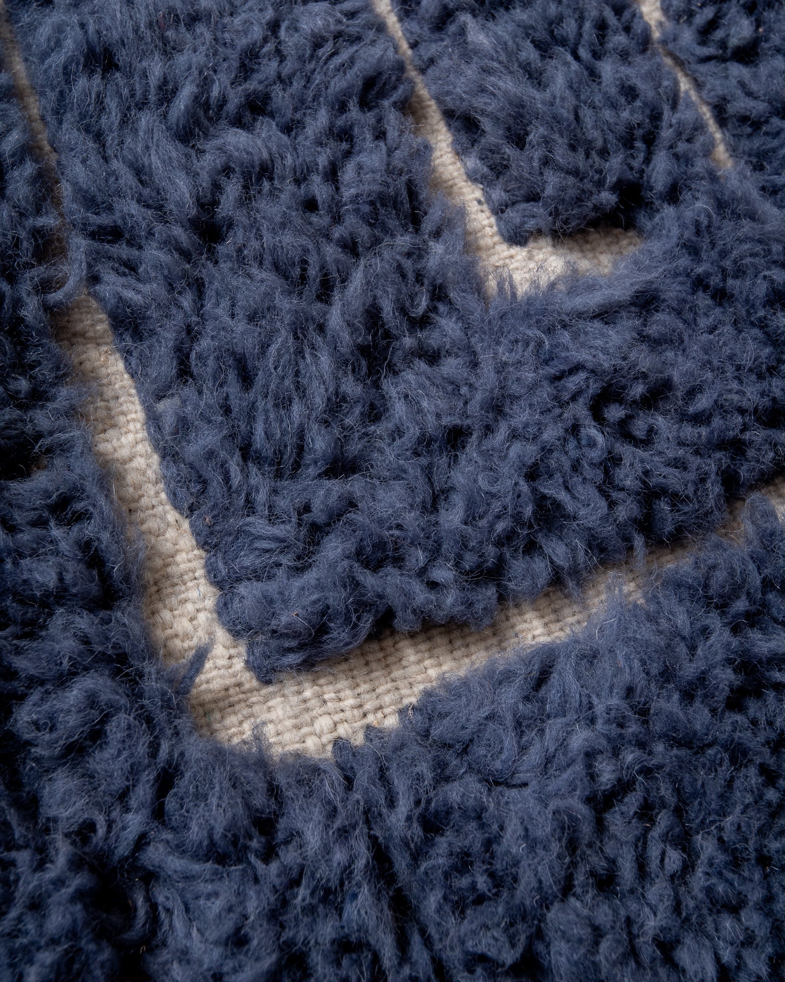 Modern, designer, handcrafted Berber rug from Morocco. Beniourain carpet with beautiful colours and patterns and fluffy wool texture.