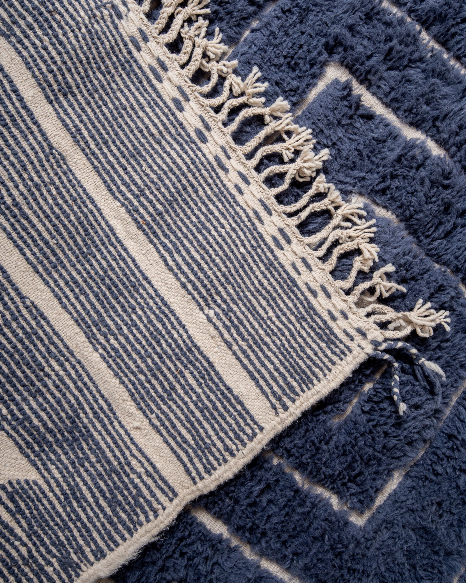 Modern, designer, handcrafted Berber rug from Morocco. Beniourain carpet with beautiful colours and patterns and fluffy wool texture.