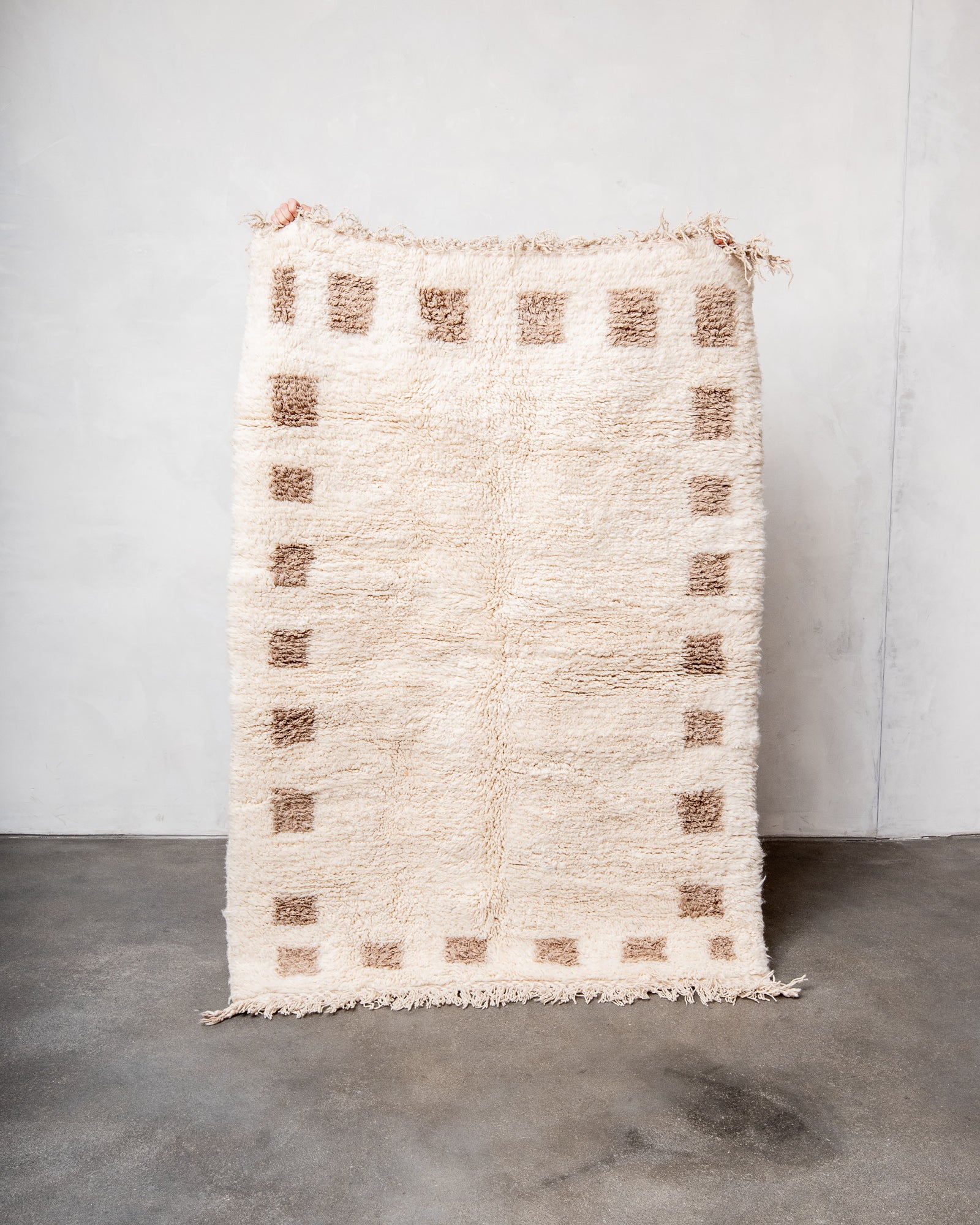 Modern, designer, handcrafted Berber rug from Morocco. Beniourain carpet with beautiful colours and patterns and fluffy wool texture.